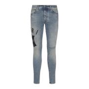 Blauwe Skinny Suède Applique Logo Jeans Amiri , Blue , Heren