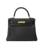 Pre-owned Leather handbags Hermès Vintage , Black , Dames