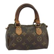 Pre-owned Canvas handbags Louis Vuitton Vintage , Brown , Dames