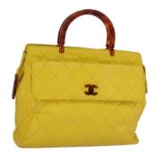 Pre-owned Leather handbags Chanel Vintage , Yellow , Dames