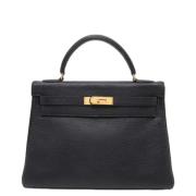 Pre-owned Leather handbags Hermès Vintage , Black , Dames