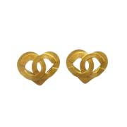 Pre-owned Metal earrings Chanel Vintage , Yellow , Dames