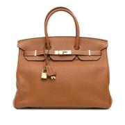 Pre-owned Leather handbags Hermès Vintage , Brown , Dames