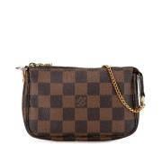 Pre-owned Canvas clutches Louis Vuitton Vintage , Brown , Dames