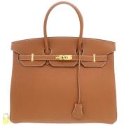 Pre-owned Leather handbags Hermès Vintage , Brown , Dames