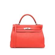 Pre-owned Leather handbags Hermès Vintage , Red , Dames