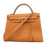 Pre-owned Leather handbags Hermès Vintage , Brown , Dames