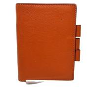 Pre-owned Leather home-office Hermès Vintage , Orange , Dames