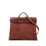 Pre-owned Canvas handbags Hermès Vintage , Brown , Dames