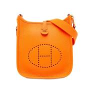 Pre-owned Leather crossbody-bags Hermès Vintage , Orange , Dames