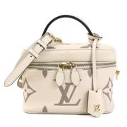 Pre-owned Canvas shoulder-bags Louis Vuitton Vintage , Beige , Dames