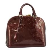 Pre-owned Leather handbags Louis Vuitton Vintage , Red , Dames