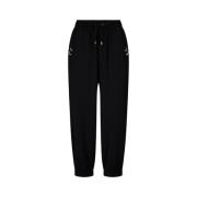 Moderne enkel-lengte sweatpants met elastische tailleband en decoratie...