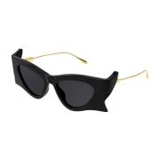 Stijlvolle zonnebril met zwart en goud Gucci , Black , Dames