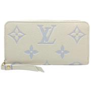 Pre-owned Leather wallets Louis Vuitton Vintage , Beige , Dames