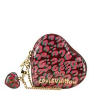 Pre-owned Fabric clutches Louis Vuitton Vintage , Red , Dames