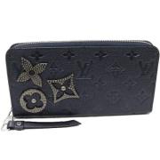 Pre-owned Canvas wallets Louis Vuitton Vintage , Blue , Dames