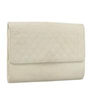 Pre-owned Leather clutches Saint Laurent Vintage , Beige , Dames