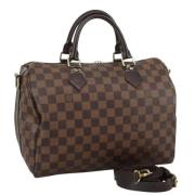 Pre-owned Canvas handbags Louis Vuitton Vintage , Brown , Dames