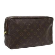 Pre-owned Canvas clutches Louis Vuitton Vintage , Brown , Dames