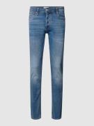 Stone-washed slim fit jeans