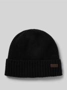 'Beanie met labelbadge