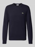 Gebreide pullover met logopatch