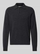 Gebreide pullover van wol met labeldetail