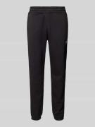 Tapered fit sweatpants met labelstitching