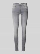 Slim fit mid rise jeans met stretch, model 'Alva'