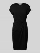 Knielange jerseyjurk met knoopdetail, model 'Faith'