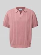 Oversized poloshirt met V-hals