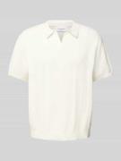 Oversized poloshirt met V-hals