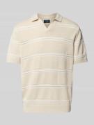 Relaxed fit poloshirt met V-hals