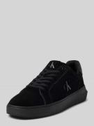 Sneakers met labeldetails
