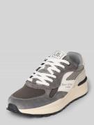 Lage sneakers van rundersuède