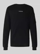 Sweatshirt met ritszak op de mouw