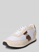 Lage sneakers met leren details