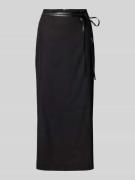 Kokerrok van linnenmix met strikceintuur