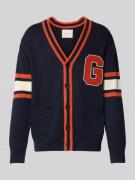 Gebreid jack met V-hals en steekzakken