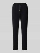 Sweatpants met galonstrepen en siersteentjes