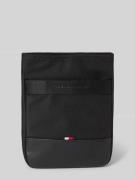 Schoudertas met labelopschrift van metaal