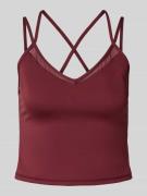 Top met spaghettibandjes en logoprint