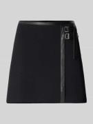 Minirok van viscosemix met ritssluiting