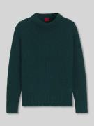 Oversized gebreide pullover van en mix van wol en alpaca, model 'SLOOS...