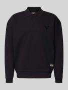 Oversized sweatshirt met polokraag