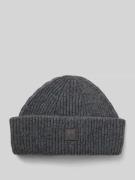 Muts van echt lamswol. model 'Low'