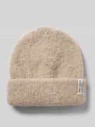 Muts van een mix met wol en alpaca