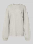 Oversized shirt met lange mouwen en labelprint