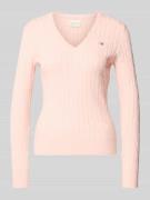 Gebreide pullover met kabelpatroon en labelstitching